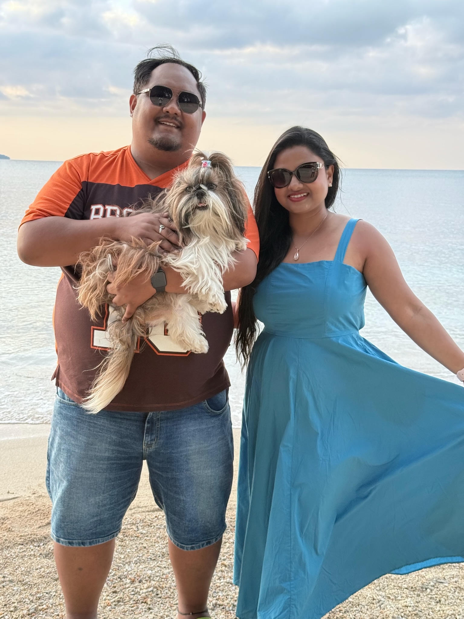 The family — mum, dad and Bunnu at the beach